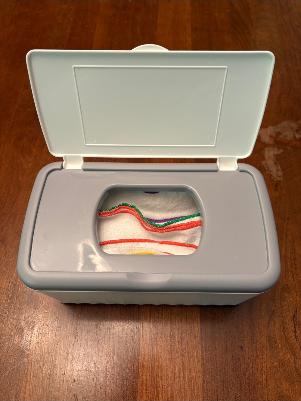 Reusable wipes and dispenser.